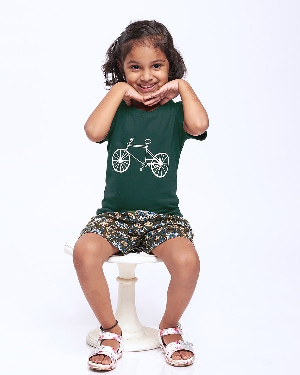 Kids' black cotton round neck t-shirt by AirGarb in bottle green with drawn cycle design.-0